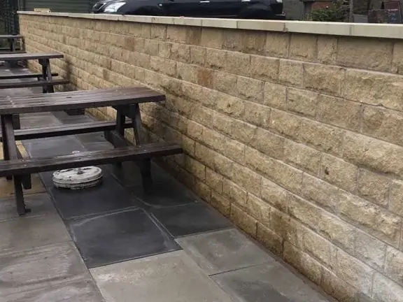 Public house and bowling green - wall re-build