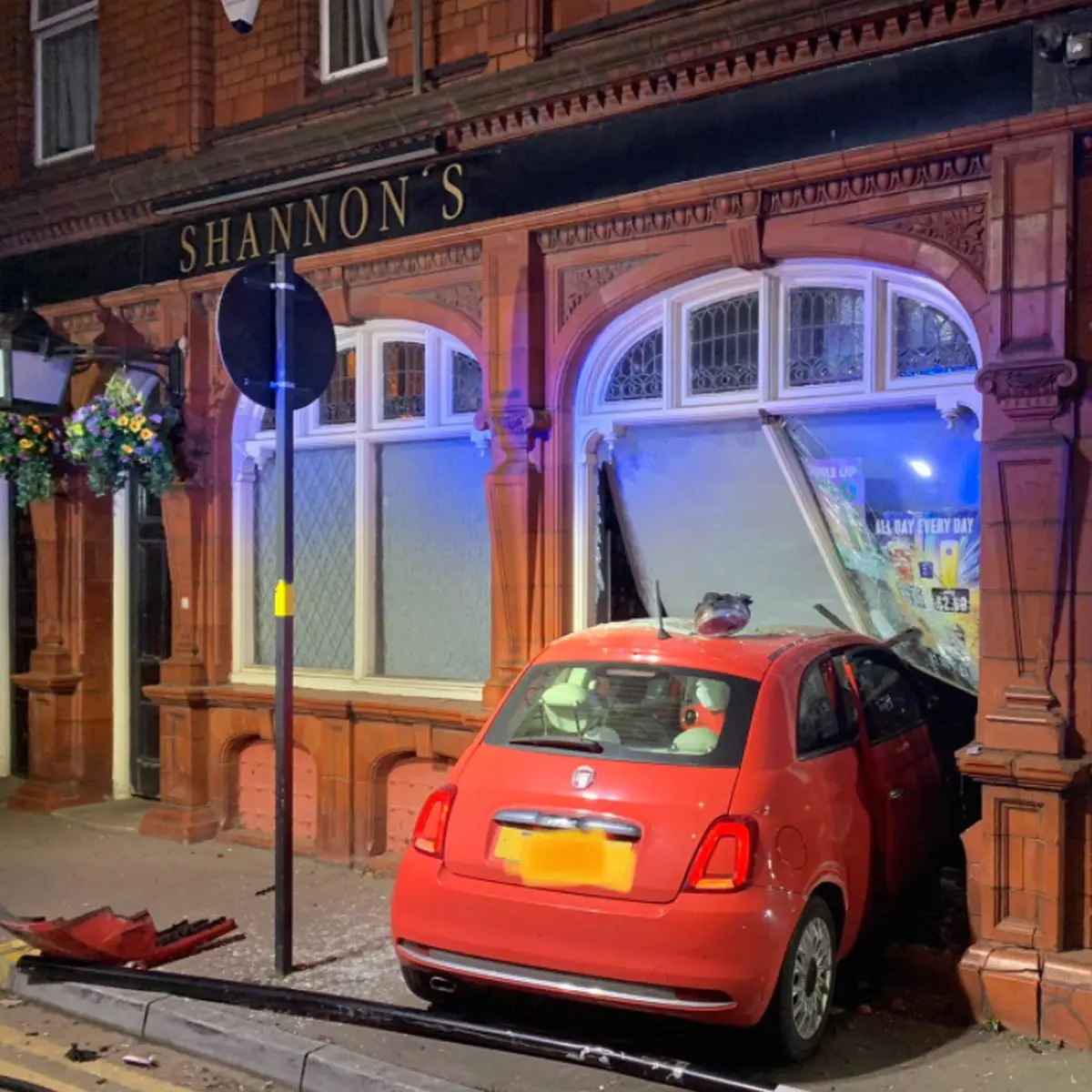 A red car has crashed through the front window of Shannon’s pub.